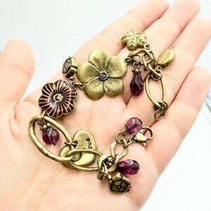 Vintage Brass Tone Floral Charm Bracelet with Purple Glass Beads